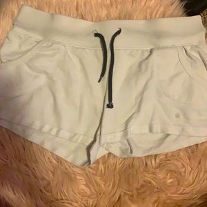 white surf style shorts